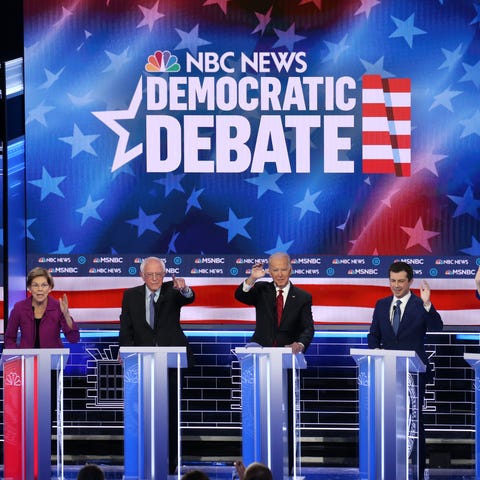 From left, Democratic presidential candidates form