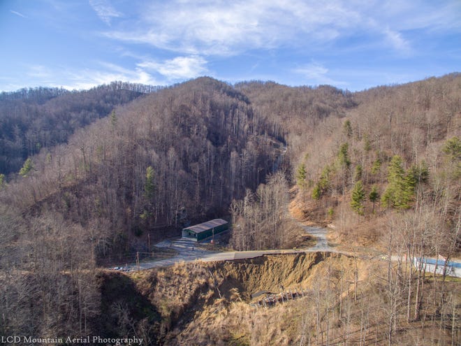 Aerial images show the damage to Walnut Creek Road from a landslide that first materialized Feb. 14.