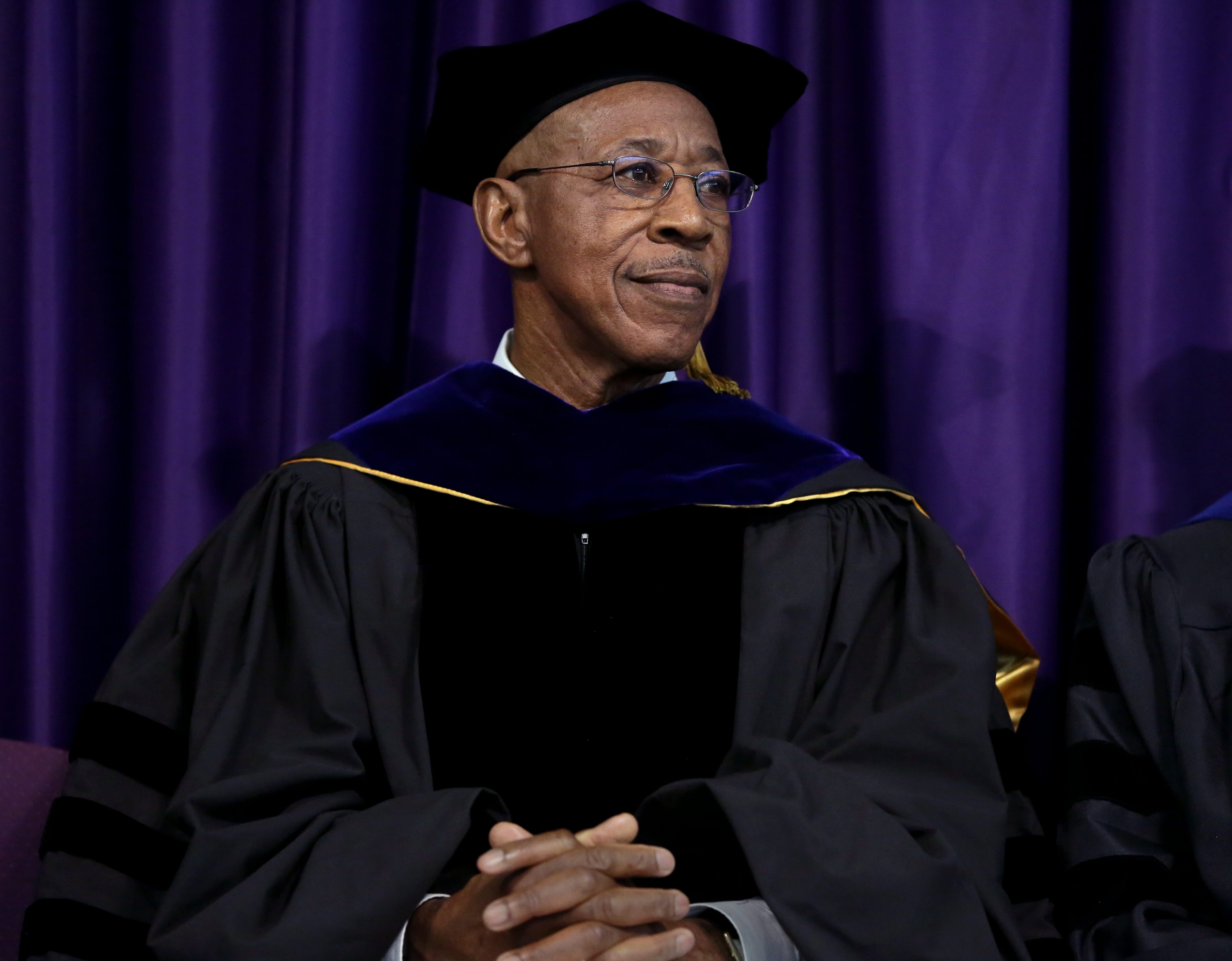 Assistant Vice Chancellor Emeritus Roger Pulliam speaks at UW-Whitewater's 2015 winter commencement ceremony.