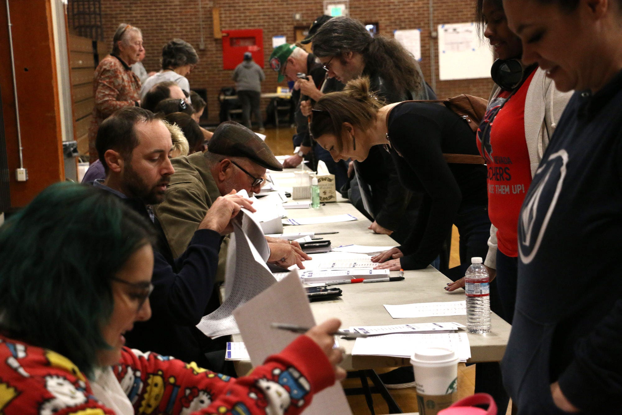 Voters gather at Sparks High School to participate in the 2020 Nevada Democratic caucus on Feb. 22, 2020.