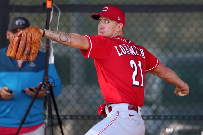 Cincinnati Reds relief pitcher Michael Lorenzen (21) delivers in the bullpen during spring practice, Monday, Feb. 17, 2020, at the baseball team's spring training facility in Goodyear, Ariz. 