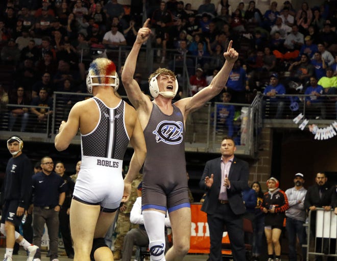 Carlsbad's Mason Box celebrates winning his second consecutive 152-pound 5A title in the New Mexico state wrestling tournament in Rio Rancho on Feb. 22, 2020.