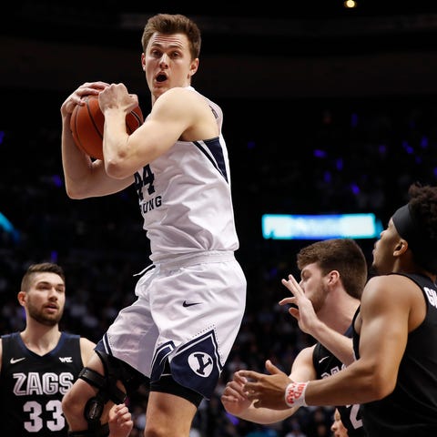 Brigham Young guard Connor Harding grabs a rebound