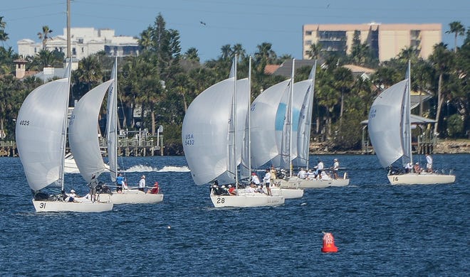 Sailboats line up to start another race during the 2017 J/24 Midwinter Championship in the Indian River in 2017. The races are hosted by the Eau Gallie Yacht Club and the Melbourne Yacht Club.