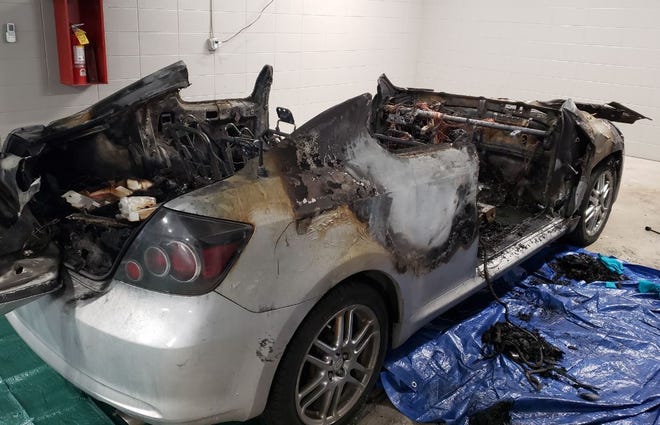 This silver Toyota is one of two cars that were burnt in what police believe is a suspected arson case on Feb. 6.