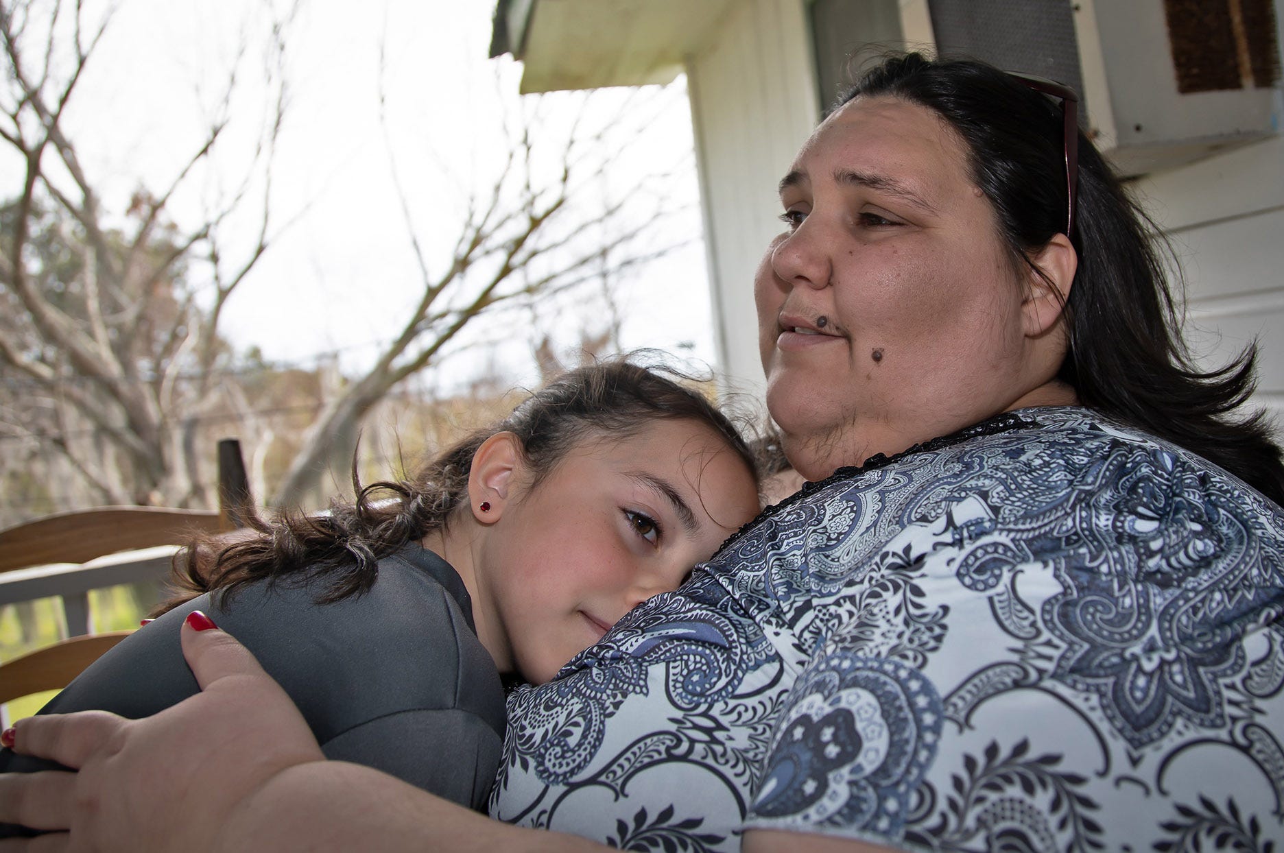 Chantel Comardelle, secretary for the Biloxi-Chitimacha-Choctaw Tribe, with her daughter.