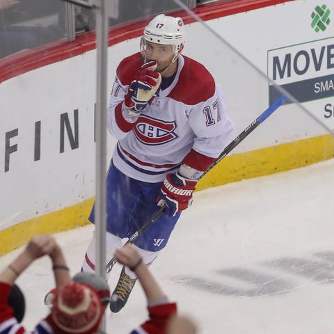 Ilya Kovalchuk gestures after scoring the game-win