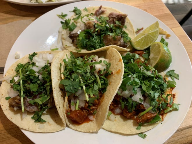 Two carnitas tacos and two tacos al pastor from ZaZa, Marco Island. 