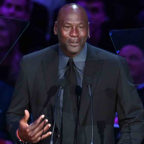 NBA legend Michael Jordan speaks to the audience d