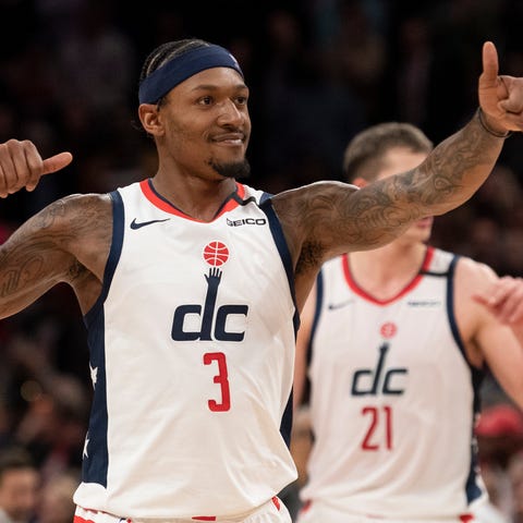 Wizards guard Bradley Beal (3) reacts after making