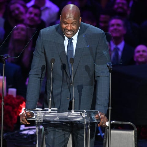 Shaquille O'Neal speaks to the audience during the