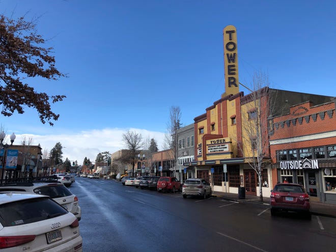 This Jan. 28, 2020 photo shows the Tower Theatre located in downtown Bend, Oregon, where the population in the early 1990s was around 25,000 and leaned Republican.
