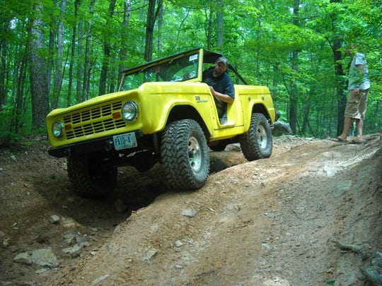 Randy Wickman, 54, of Rindge, Hampshire, takes his 1973 Ford Bronco off-roading.