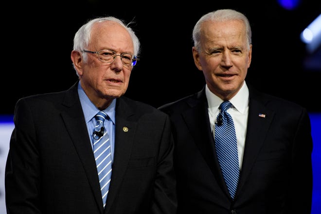 Democratic presidential candidates Bernie Sanders and Joe Biden during the South Carolina Democratic debate in Charleston Tuesday, Feb. 25, 2020.