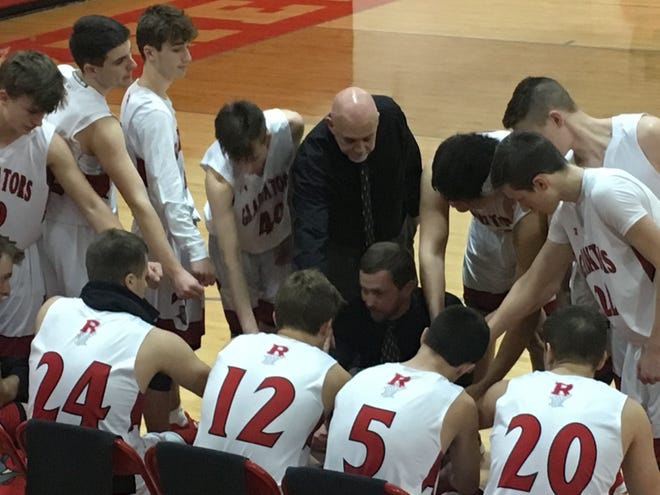 Riverheads coach Chad Coffey talks to his team during a timeout Tuesday in the Region 1B boys basketball quarterfinals.
