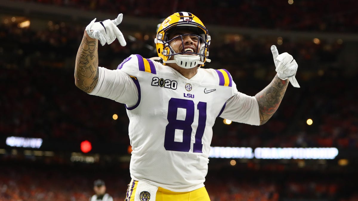 LSU Tigers tight end Thaddeus Moss (81) celebrates after scoring a touchdown against the Clemson Tigers in the third quarter in the College Football Playoff national championship game at Mercedes-Benz Superdome.