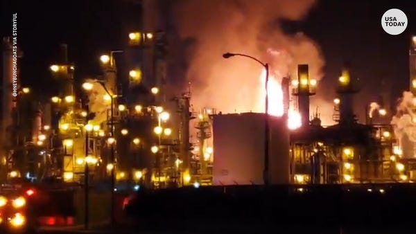 Giant refinery fire lights up Los Angeles skyline