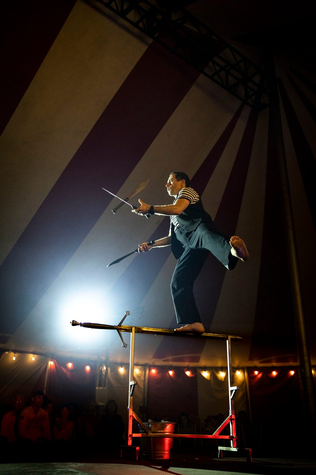 A performer juggles knives. Venardos Circus will make a stop in Shreveport for shows March 4-15 at Riverview Park.