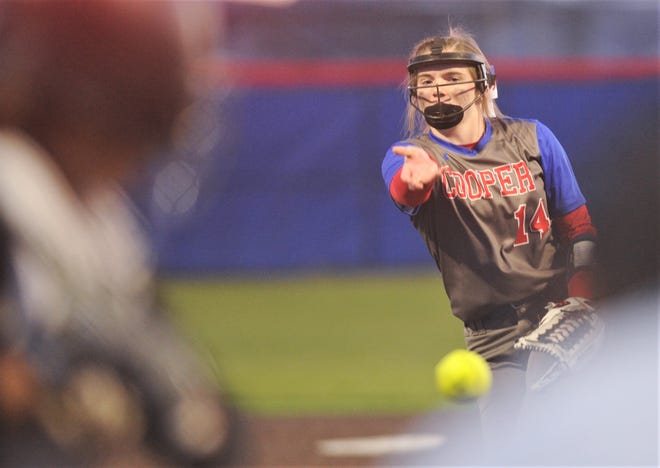 Cooper pitcher Summer Simmons throws a pitch to a Lubbock High batter in the first inning of the Ice Breaker softball tournament game Thursday at Cougar Diamond. Cooper won the game 7-1, though it only went four innings and didn't count as an official game.