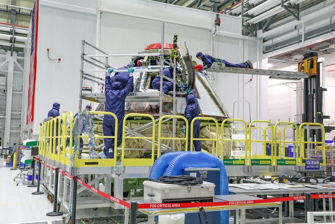 Inside the Starliner production factory at Kennedy Space Center, technicians inspection the Orbital Flight Test crew module after its return from space, and begin the refurbishment process ahead of future flights.