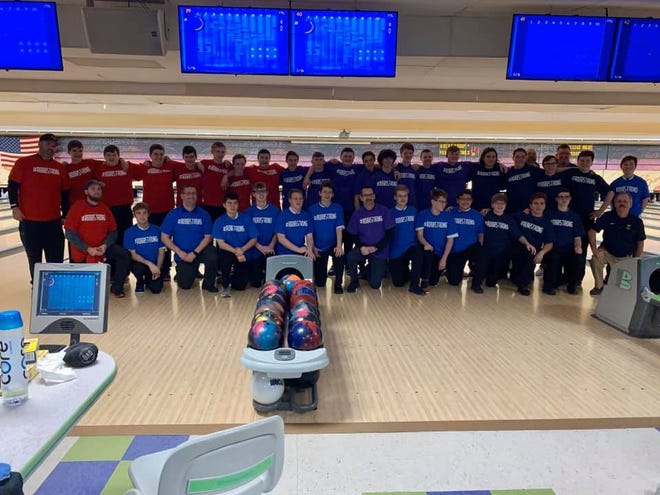 Bowlers from the Greater Catholic League South show off their #ROBBSTRONG shirts at the Division I district tournament Feb. 27, honoring Seton bowling coach Jim Robb who was diagnosed with cancer in November.
