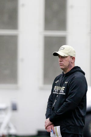 Purdue head coach Jeff Brohm watches during a football practice, Friday, Feb. 28, 2020 in West Lafayette.