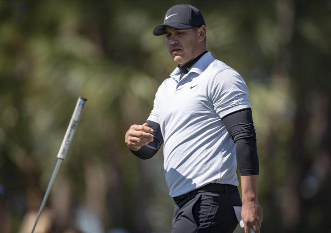 Brooks Koepka throws his putter after his birdie putt on the third hole lips out during the second round of the Honda Classic on Friday, Feb. 28, 2020, at PGA National in Palm Beach Gardens.