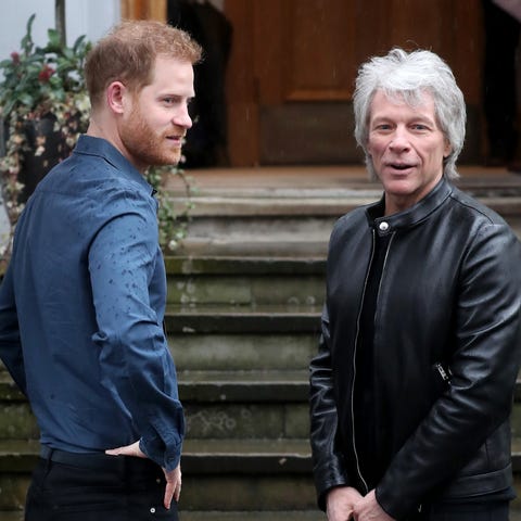Prince Harry and Jon Bon Jovi arrive to meet membe