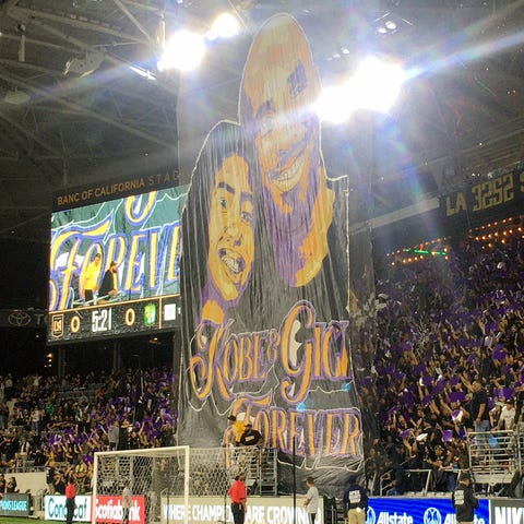 Los Angeles FC supporters section unveil a tifo in
