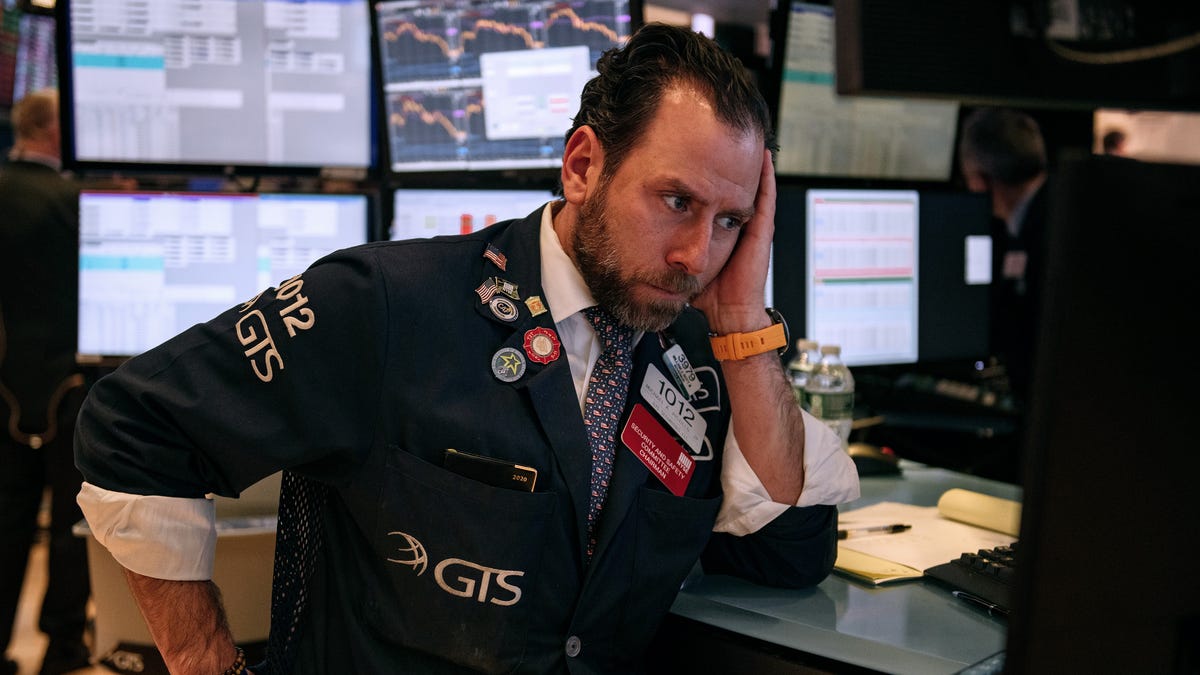Traders work on the floor of the New York Stock Exchange on Feb. 27, 2020 in New York City.  With concerns growing about how the coronavirus might effect the economy, stocks fell for the fourth straight day. The Dow Jones Industrial Average lost almost 1200 points on Thursday. 