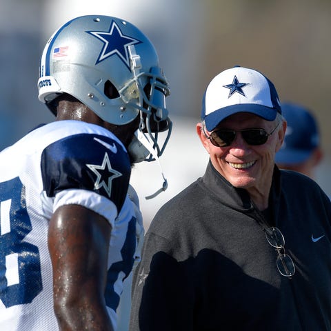 Dallas Cowboys owner Jerry Jones, right, talks wit