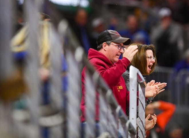 Spectators cheer from seats in the upper balcony during in the high school state semifinals on Friday, Feb. 28, at the Denny Sanford Premier Center in Sioux Falls.