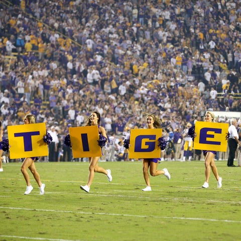 LSU Tigers cheerleaders on the field before their 