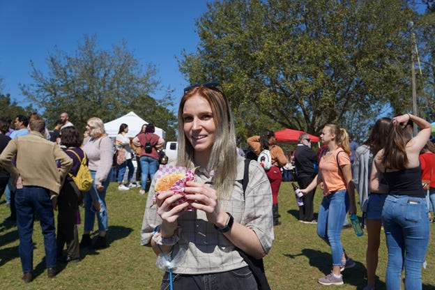 Staff Writer Morgan Nystrom partakes in the festivities and enjoys a vegan burger at the North Florida VegFest.