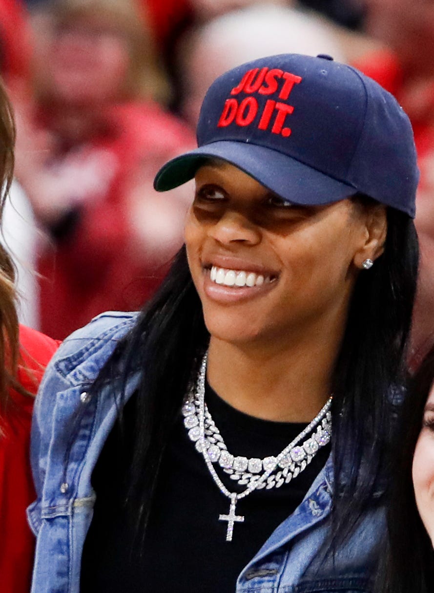 Former Louisville guard Asia Durr returned to the KFC Yum Center to a stand...