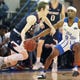 Belmont's Adam Kunkel drives against Mark Freeman of the State of Tennessee in the Bruins' victory Saturday night at the Gentry Center. 