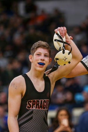 Sprague's Brayden Boyd wins the 106-pound weight class during the OSAA Class 6A wrestling championship at the Memorial Coliseum in Portland on Saturday, Feb. 29, 2020.