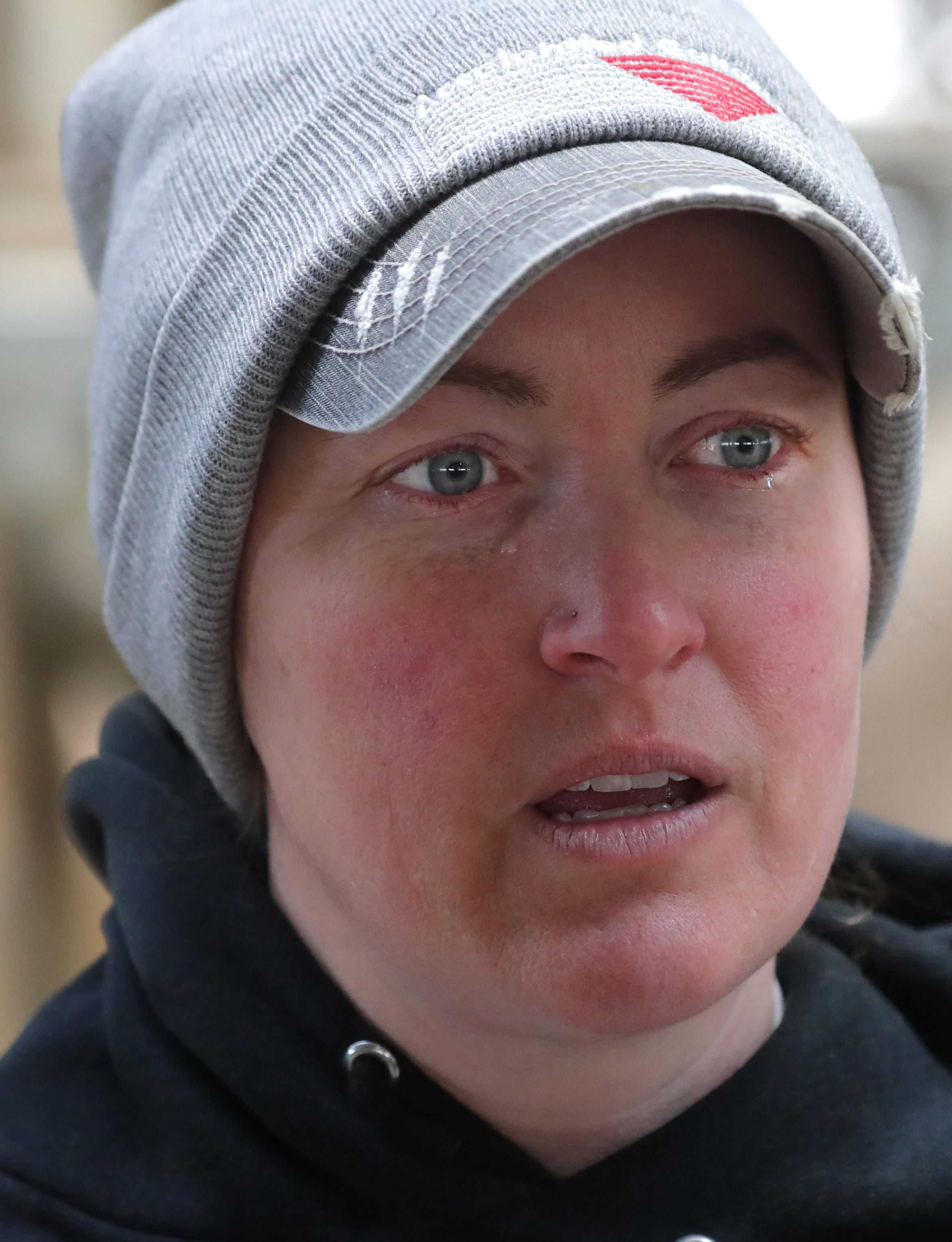 Herdswoman Becky Adams tears up while talking about her dairy herd.