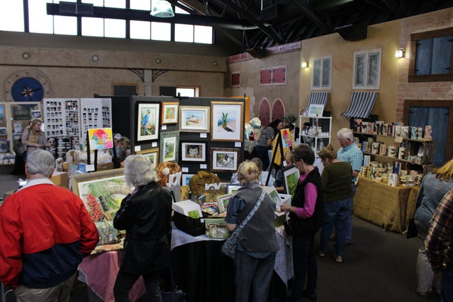 Local art enthusiasts gather to look over selections at the 2019 Pike Road Art Market. The ninth annual Pike Road Art Market is set for Saturday.
