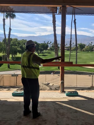 Frank Melon, general manager of The Lakes Country Club in Palm Desert, walks through interior of the clubhouse being renovated as part of a $19 million project that includes a new fitness center a 27-hole private club.