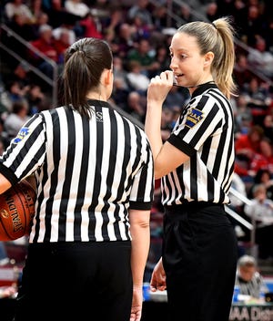 Referee Jenny Horvatinovic talks with another official during Central York's District 3 Class 6-A girls' basketball final against Central Dauphin at the Giant Center Saturday, Feb. 29, 2020. Horvatinovich played basketball at Dallastown and Red Lion during her high school career. Bill Kalina photo
