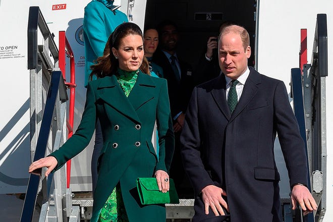 British Prince William, Duke of Cambridge (R) and Catherine, Duchess of Cambridge (L), disembark upon arrival at Dublin International Airport in Dublin on March 3, 2020 at the start of a three-day visit.