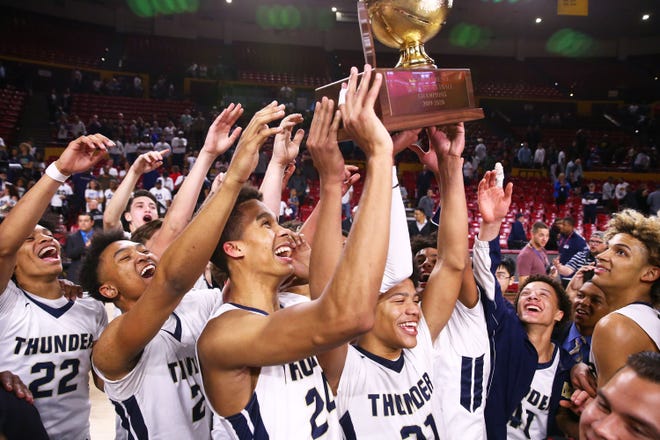 Desert Vista celebrates their victory over Mountain Pointe to win the 6A high school boys basketball championship on Mar. 3, 2020 in Tempe, Ariz.