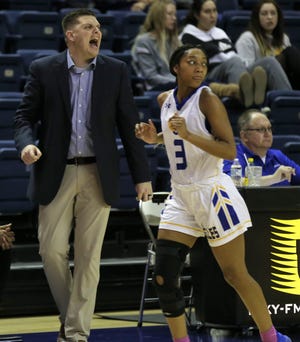 Angelo State University head coach Nate Harris gets fired up as Asia Davis keeps her eyes on the ball earlier in the season. The Belles were scheduled to play in the South Central Regional in Lubbock beginning on Friday, but the tournament was canceled due to coronavirus (COVID-19) concerns.