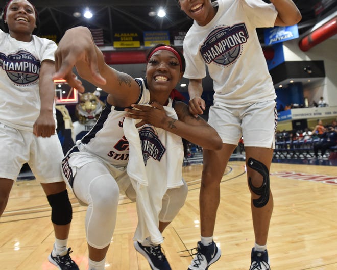 Players from the Jackson State University women's basketball team celebrate following their win of the South Western Athletic Conference title against Arkansas Pine-Bluff, 68-47, on Monday at JSU in Jackson. For the first time since 2007, the women's basketball team had won the Southwestern Athletic Conference regular-season championship. Monday, March 2, 2020.