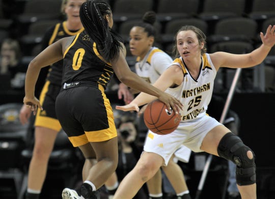 NKU sophomore Ally Niece keeps close watch on her opponent as Northern Kentucky University women's basketball team defeated Milwaukee 78-58 in the quarterfinals of the Horizon League Tournament March 5, 2020 at BB&T Arena, Highland Heights, Ky.
