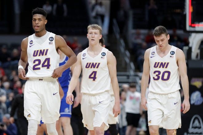 Northern Iowa's Isaiah Brown (24), AJ Green (4) and Spencer Haldeman (30) head off the court following an NCAA college basketball game against Drake in the quarterfinal round of the Missouri Valley Conference men's tournament Friday, March 6, 2020, in St. Louis. Drake upset Northern Iowa 77-56. (AP Photo/Jeff Roberson)