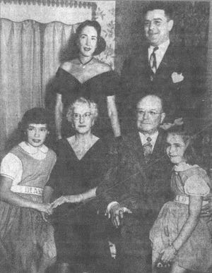 This photo was taken when Mr. & Mrs. Thomas Fulton celebrated their 45th anniversary at Timbertop. Standing are Mr. & Mrs. Cyrus Fulton. Seated are Mr. & Mrs. Thomas C. Fulton, with their two granddaughters, Miss Diana and Miss Holly Fulton. The photo appeared in the Eagle-Gazette 12 Nov. 1951.