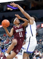 Missouri State's Isiaih Mosley (11) puts up a shot against Indiana State at the Missouri Valley Conference Tournament, Friday, March 6, 2020, at the Enterprise Center in St. Louis. 