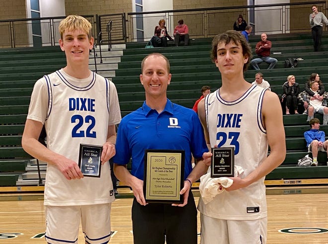 Dixie coach Tyler Roberts poses with his 4A Coach of the Year award, along side Noah Lemke and Jordan Mathews who were UHSBCA All-Stars.